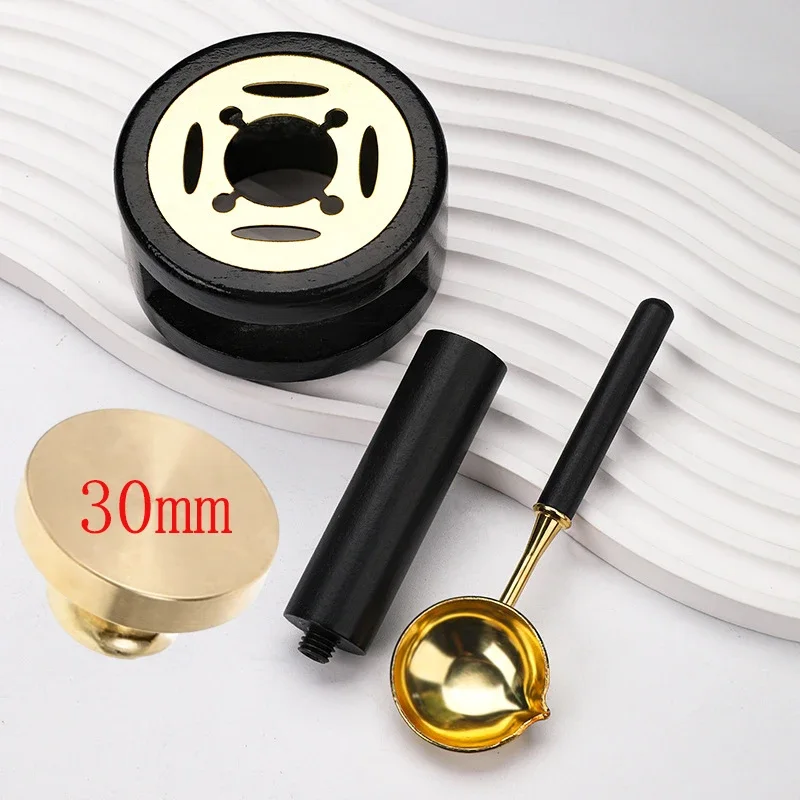 Black kit: wax warmer, handle, melting spoon and brass stamp head